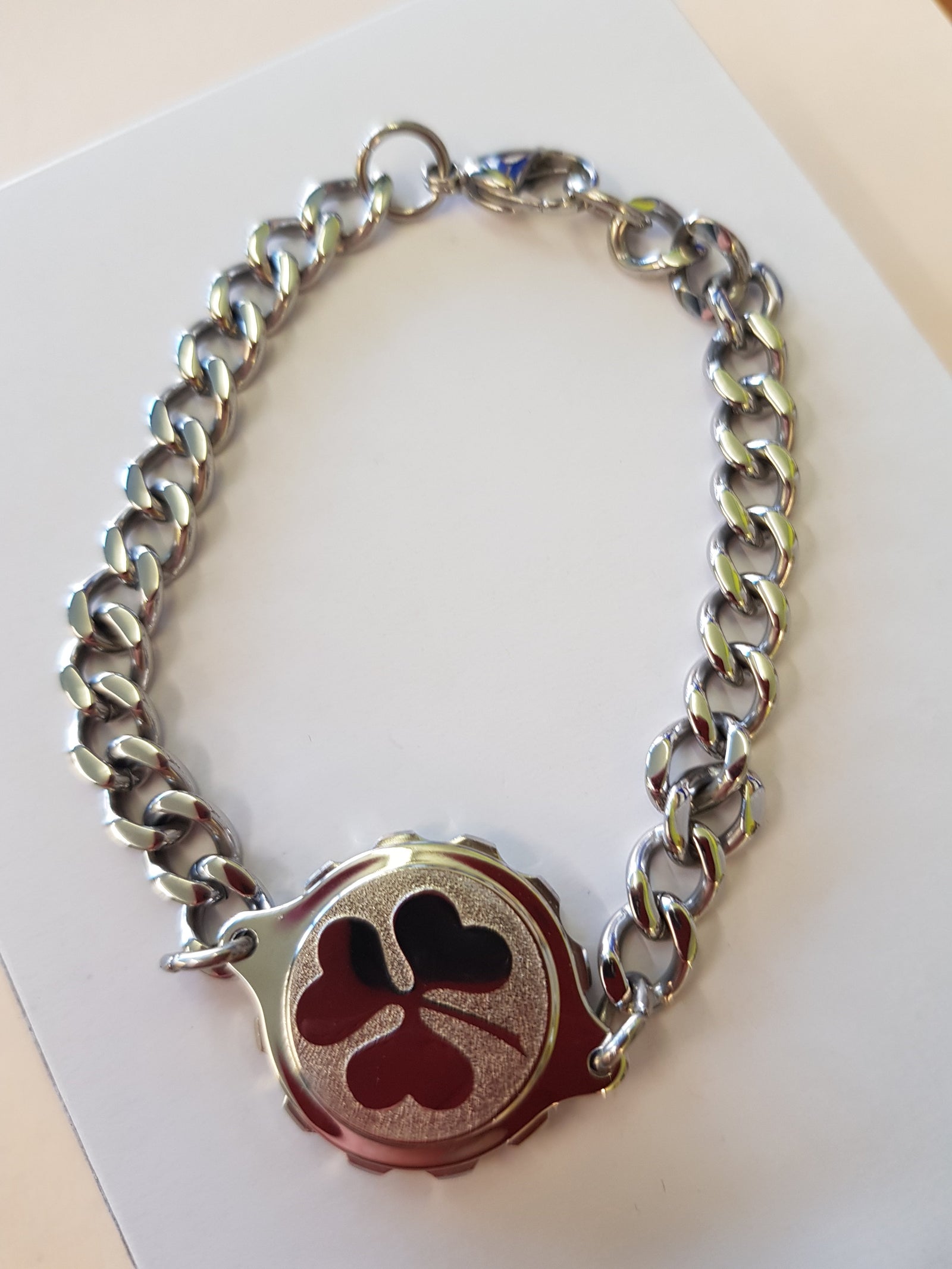 235 121 LADIES STEEL BRACELET WITH SHAMROCK DESIGN