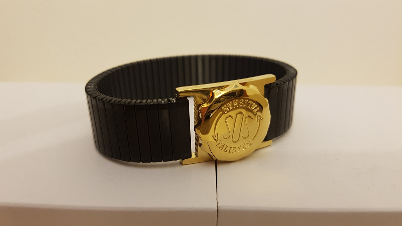 237 124 - Gold Tone Watch Attachment On Black Expanding Bracelet